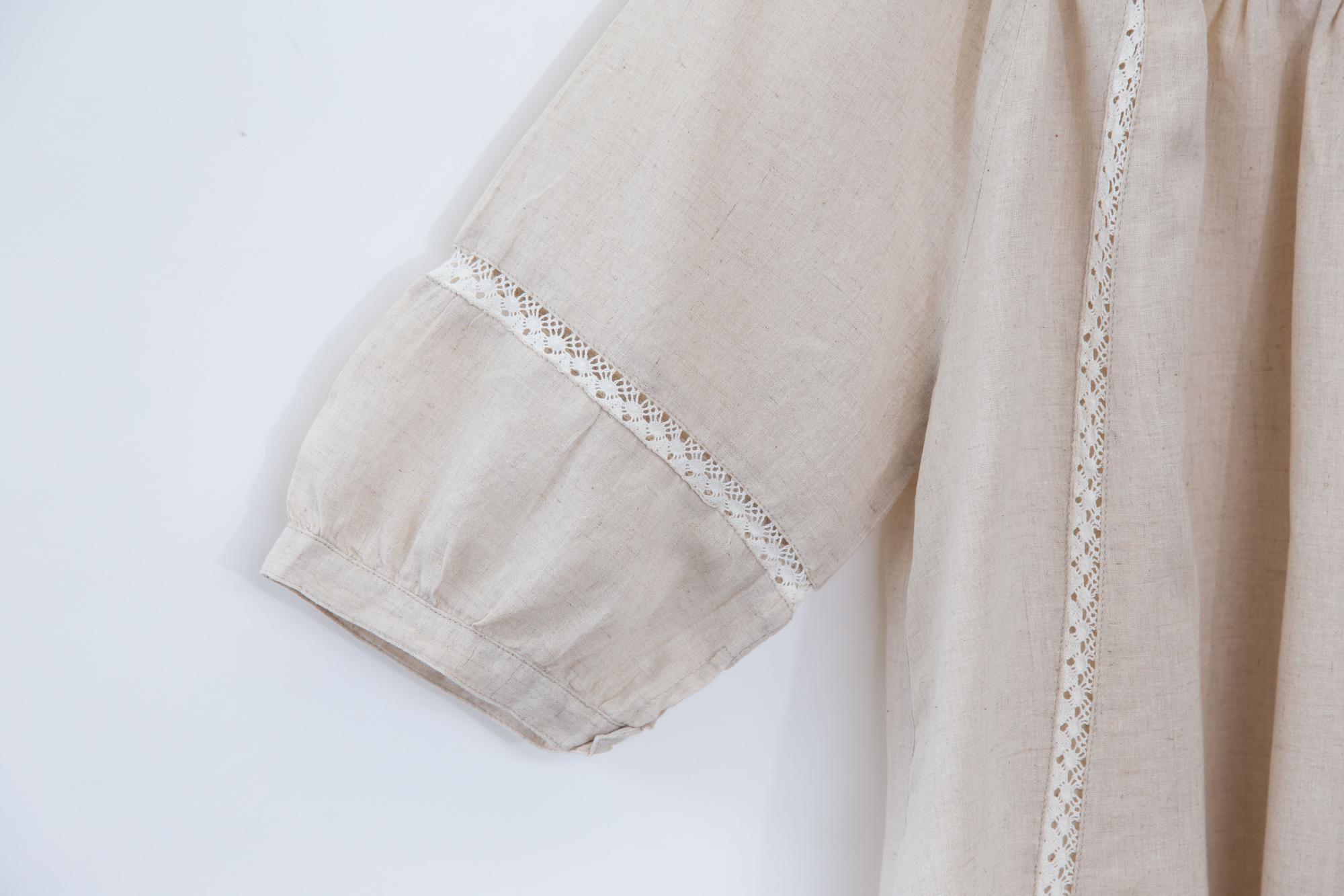 Embroidered cuff detail on linen